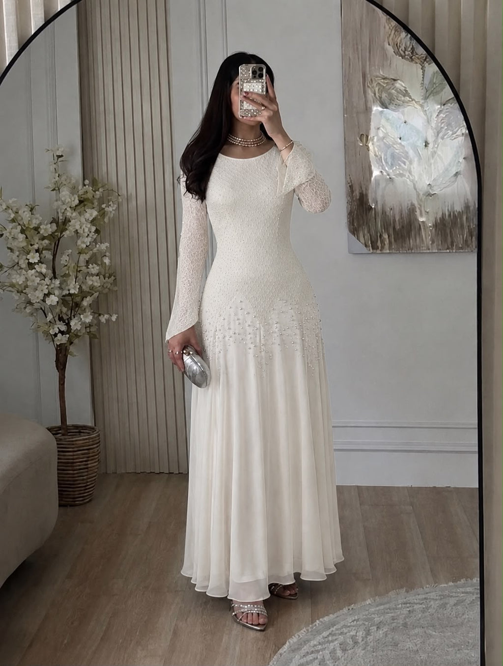 Evening dress adorned with pearls