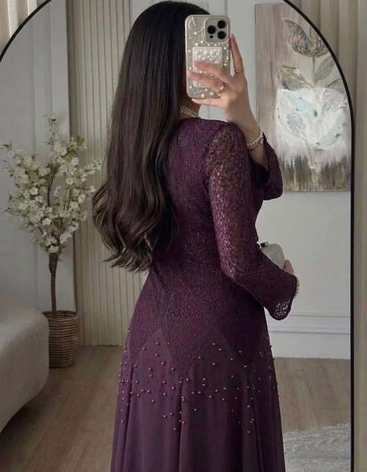 Evening dress adorned with pearls