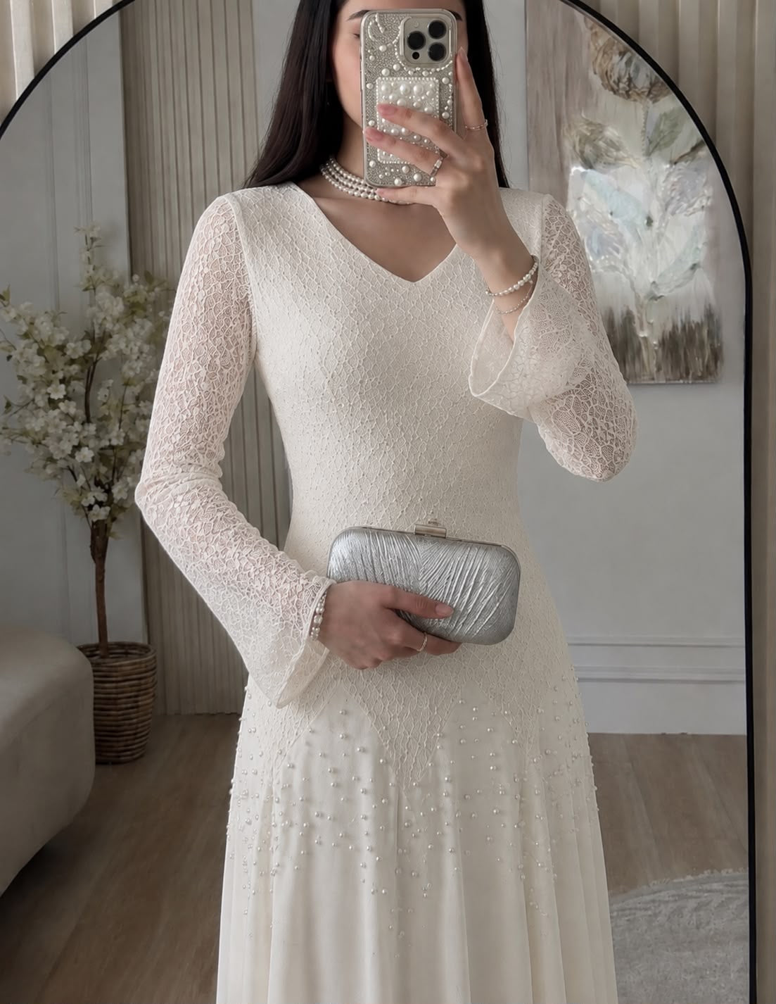 Evening dress adorned with pearls